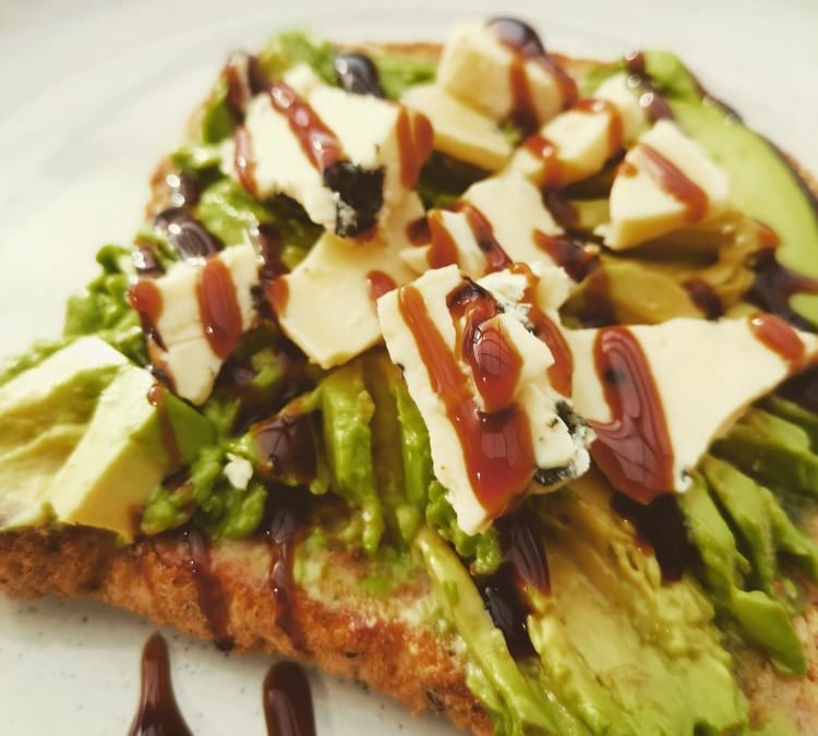 Smashed Avocado Topped with Blue Cheese and Balsamic Glaze